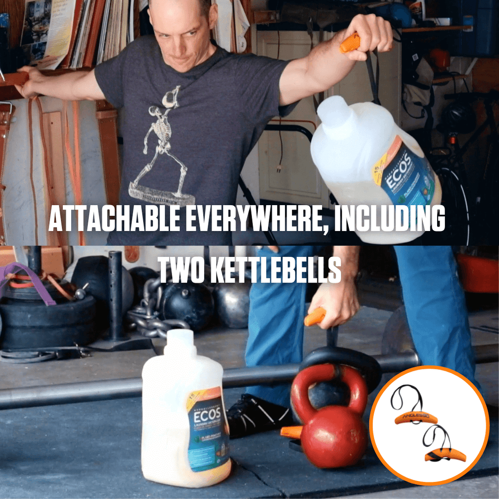 A man creatively enhances his workout by attaching resistance bands and A90 Cable Pulley Set to kettlebells in a home garage gym setting.